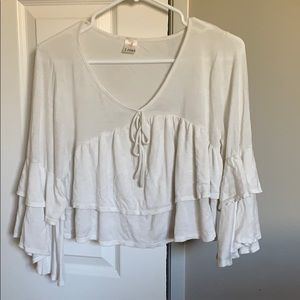 White ruffled top